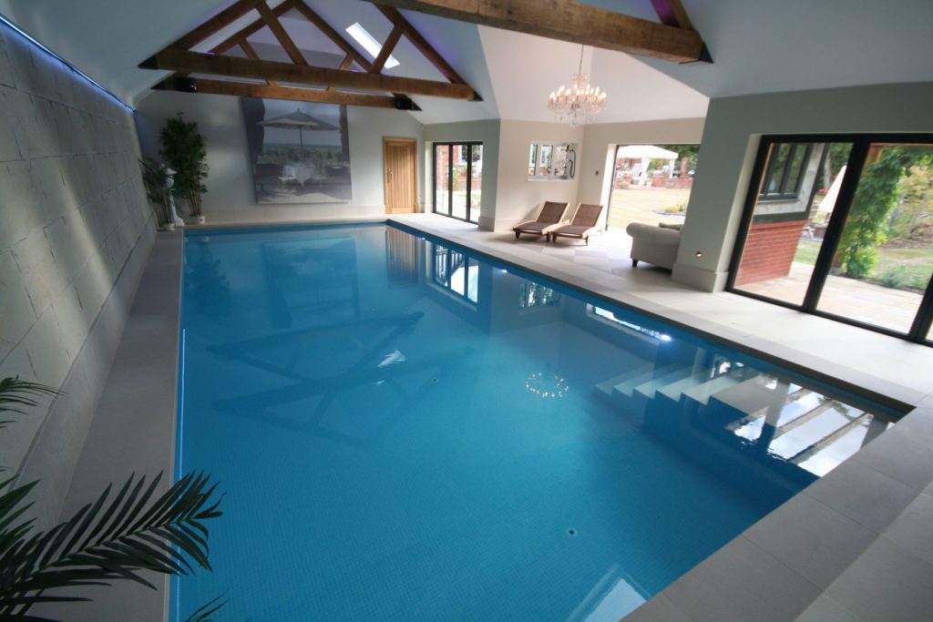 Bronze Award British Pool & Hot Tub Awards 2017 Residential Indoor Pools. This serene pool features a Fastlane counter current and an automatic slatted cover by Ocea