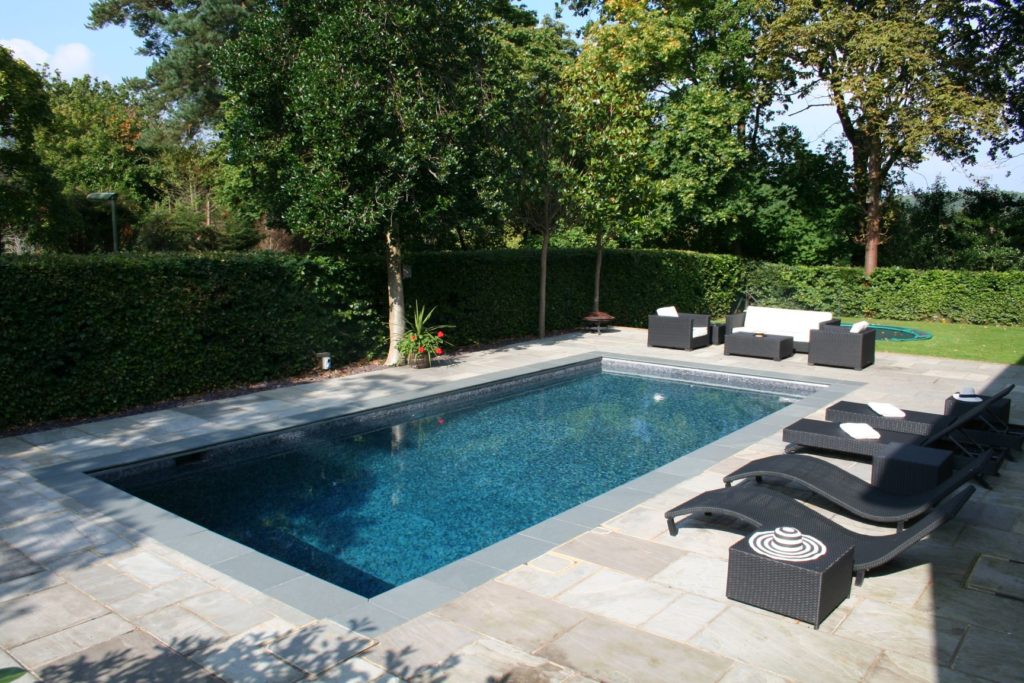 Stunning contemporary styling in this Surrey outdoor pool