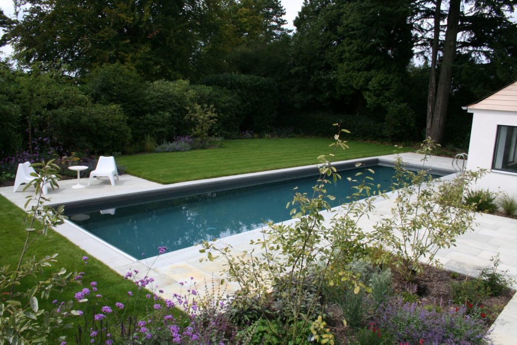 White and stainless steel fittings in this slick, modern pool