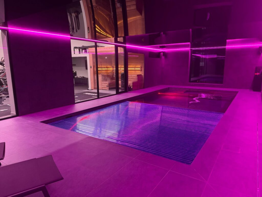 Award winning indoor pool with Eva counter current and automatic cover