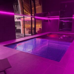 Award winning indoor pool with Eva counter current and automatic cover